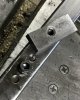 Slug and drilled holes prior to welding.jpg